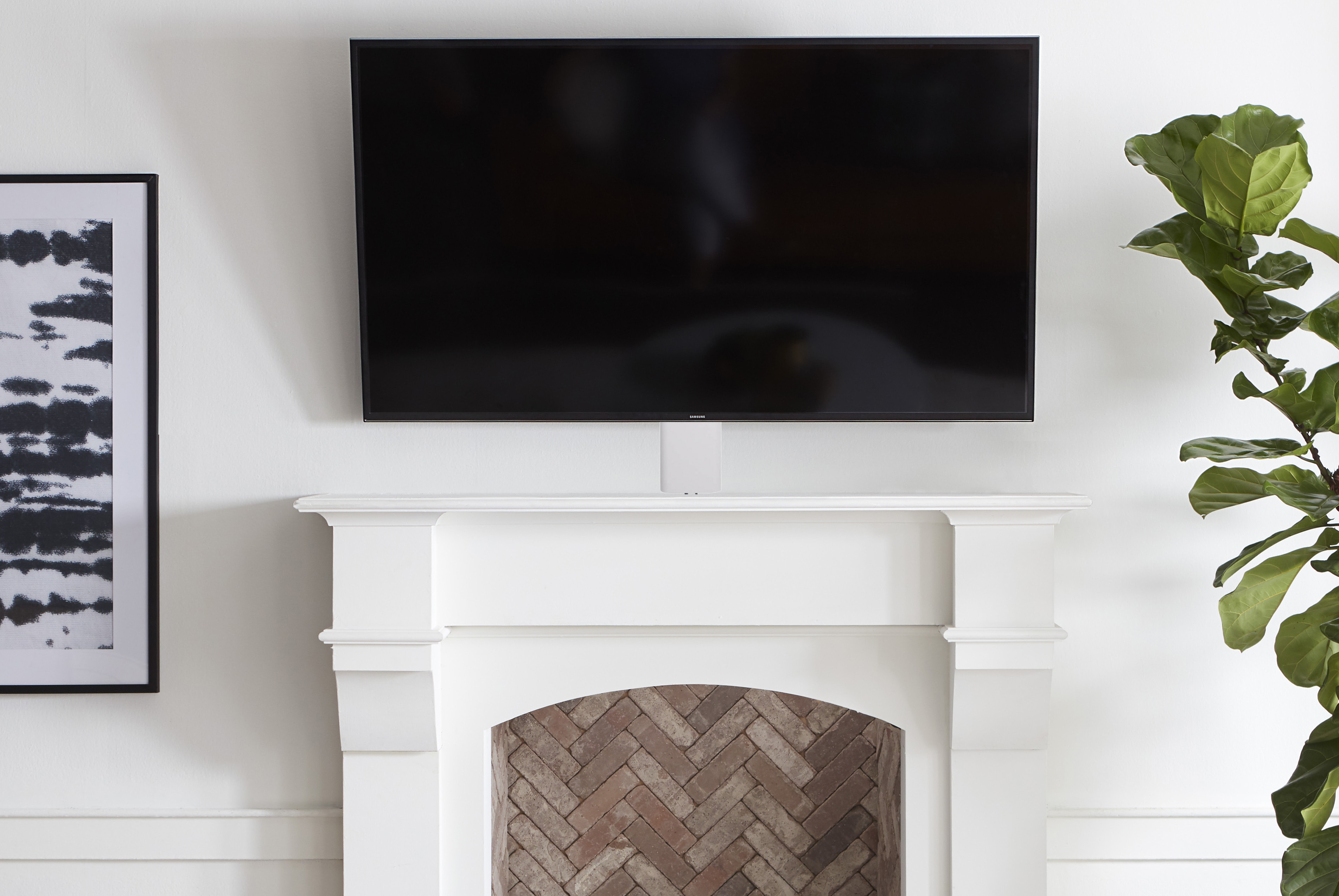 hide cables over fireplace tv