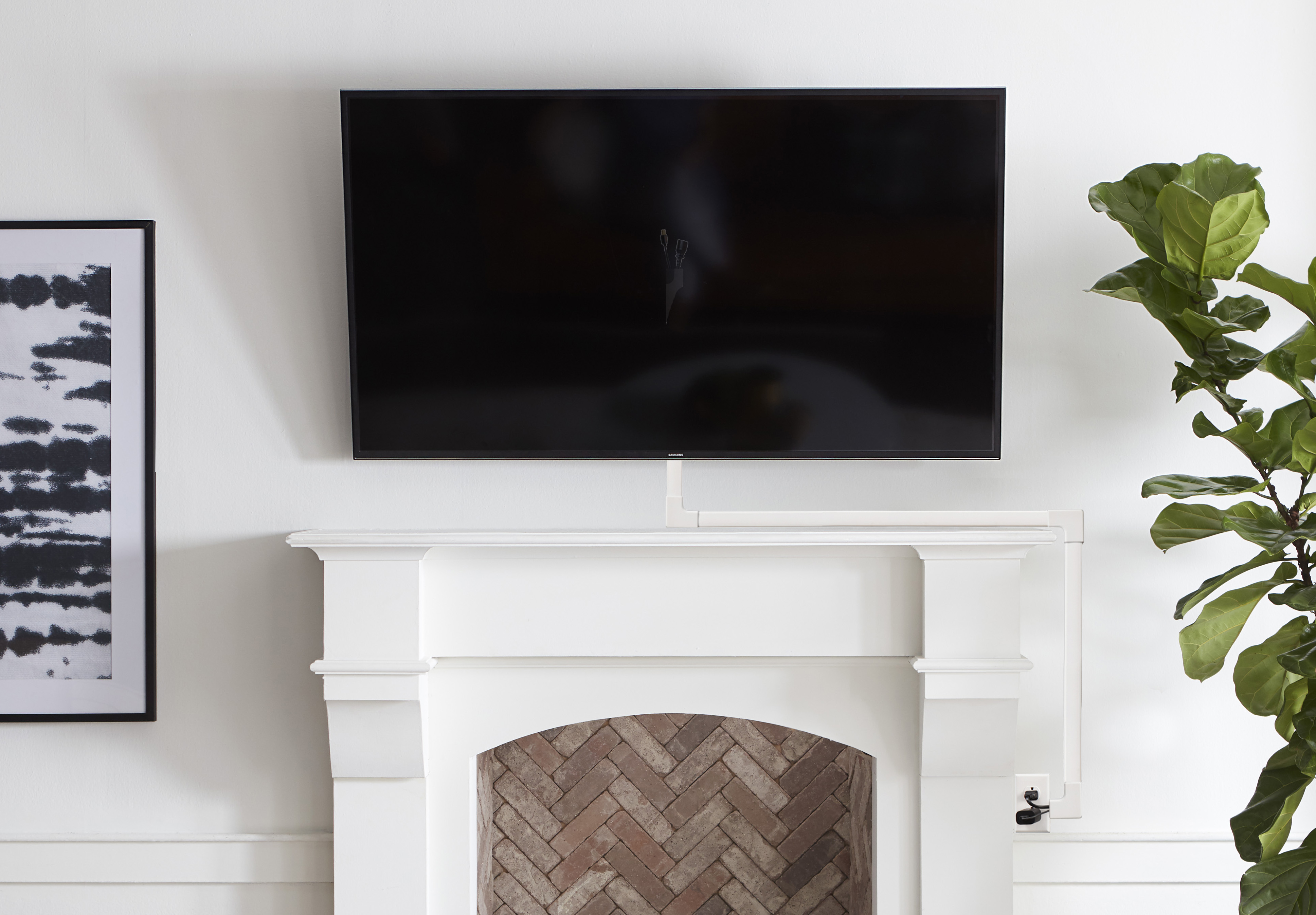 conceal tv cables over fireplace